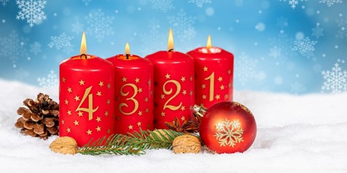 Fourth 4th Advent with candle Christmas Christmas card for Christmas time snow background with text