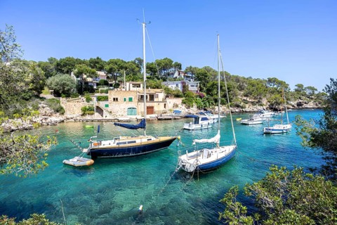 Bay of Cala Figuera on Majorca with boats holiday by the sea trip in Cala Figuera, Spain