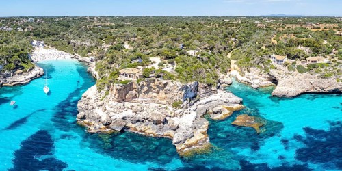 Aerial view beach Cala Llombards on the island Majorca panorama from above in the Mediterranean Sea