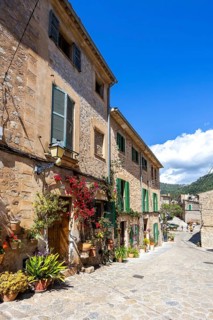 Valldemossa village on Majorca building with flowers trip in Valldemossa, Spain