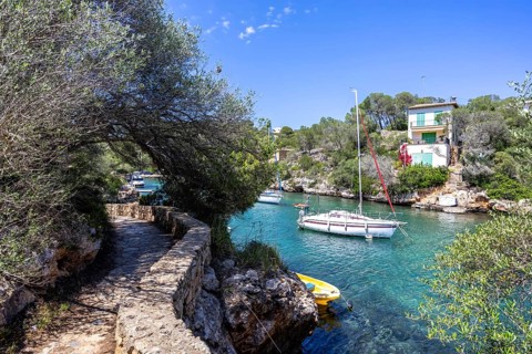Bay of Cala Figuera on Majorca with boats holiday by the sea trip in Cala Figuera, Spain