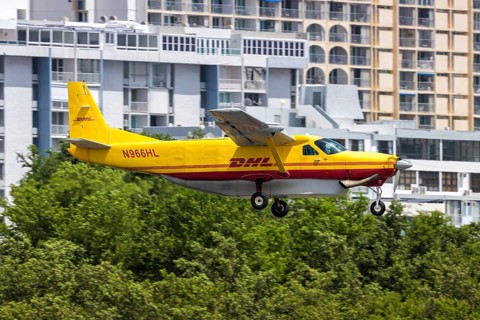 A DHL Cessna 208B Grand Caravan aircraft with licence plate N966HL at San Juan Airport, Puerto Rico