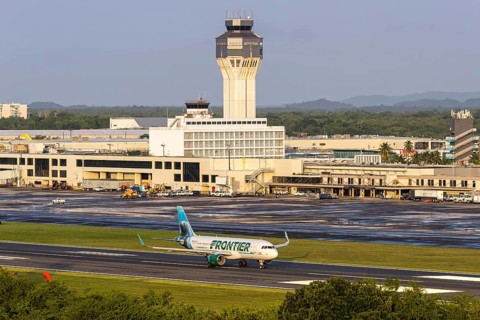 A Frontier Airlines Airbus A320 aircraft with the registration number N238FR at San Juan Airport,
