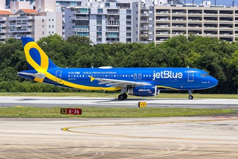 A JetBlue Airways Airbus A320 aircraft with the registration N775JB and the JetBlue Honours our