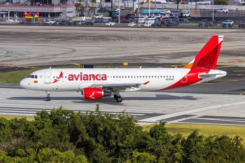An Avianca Airbus A320 aircraft with registration number N230AC at San Juan Airport, Puerto Rico