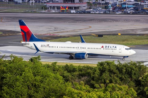 A Boeing 737-900ER aircraft of Delta Air Lines with the registration N837DN at San Juan Airport,