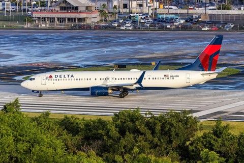 A Boeing 737-900ER aircraft of Delta Air Lines with the registration number N848DN at San Juan