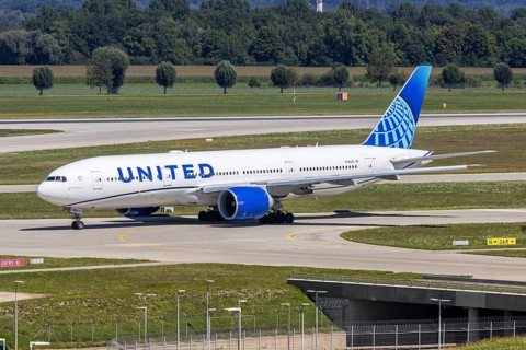 A United Airlines Boeing 777-200ER aircraft with the registration number N78002 at Munich Airport,