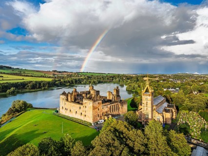 Rainbow over Linlithgow Palace from a drone, Linlithgow Loch, West Lothian, Scotland, United
