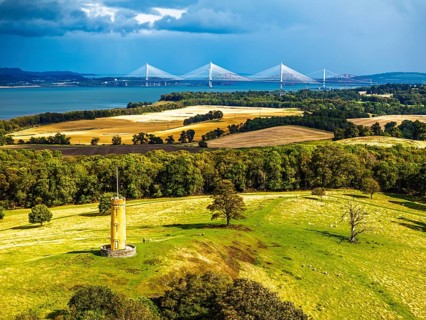 Binns Tower over Scotish farms and Forth Estuary from drone, House of the Binns, Linlithgow,
