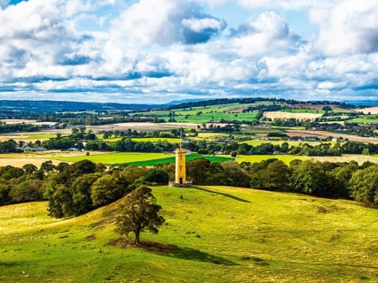 Binns Tower over Scotish farms and Forth Estuary from drone, House of the Binns, Linlithgow,