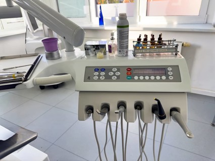 Instruments drills for dental treatment dental hygiene on panel board console with digital display