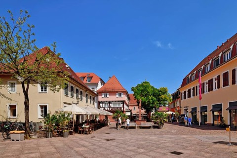 Ettlingen, Germany - August 13th 2025: Fountain at Ettlingen Schlosplatz town square on a sunny day