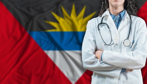 Medical professional on Antigua and Barbuda flag. Healthcare and wellness in Antigua and Barbuda,