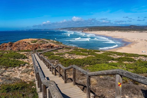 Viewpoint above the beach Praia da Bordeira, near Carrapateira, wooden walkway, rocky coast, steep