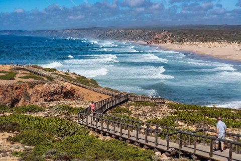 Viewpoint above the beach Praia da Bordeira, near Carrapateira, wooden walkway, rocky coast, steep