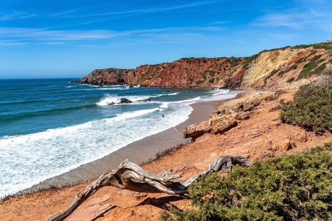 Praia do Amado beach near Carrapateira, popular with surfers, wave riders, rocky coast, steep coast