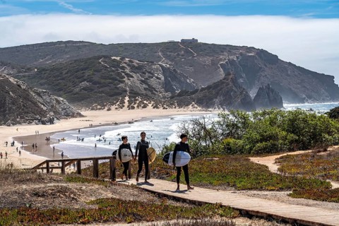 Praia do Amado beach near Carrapateira, popular with surfers, wave riders, rocky coast, steep coast