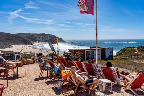 Praia do Amado beach near Carrapateira, popular with surfers, wave riders, rocky coast, steep coast