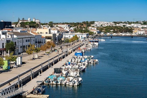 The old town centre of Tavira, on the Gilao River, boats, fishing boats, waterfront promenade, in
