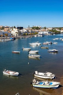 The old town centre of Tavira, on the Gilao river, boats, fishing boats, in the Algarve, Portugal