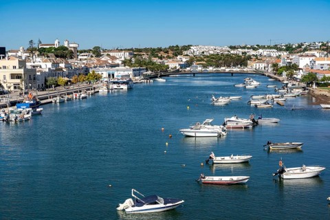 The old town centre of Tavira, on the Gilao river, boats, fishing boats, in the Algarve, Portugal