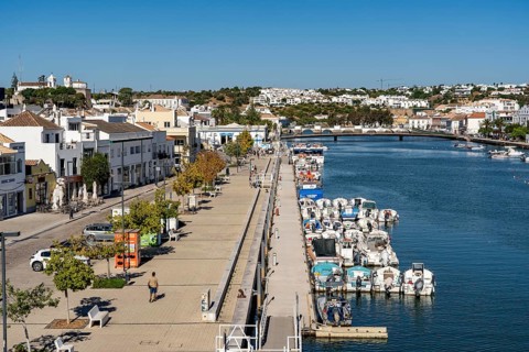 The old town centre of Tavira, on the Gilao River, boats, fishing boats, waterfront promenade, in