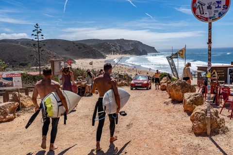Praia do Amado beach near Carrapateira, popular with surfers, wave riders, rocky coast, steep coast
