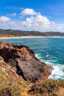Praia do Amado beach near Carrapateira, popular with surfers, wave riders, rocky coast, steep coast