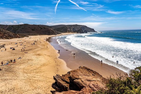 Praia do Amado beach near Carrapateira, popular with surfers, wave riders, rocky coast, steep coast