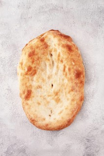 Georgian lavash bread, freshly baked, top view, on the table, no people