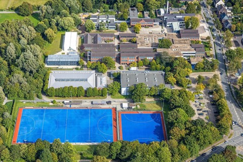 Aerial view, comprehensive school Hiesfeld, sports field with blue field and sports hall TV Jahn