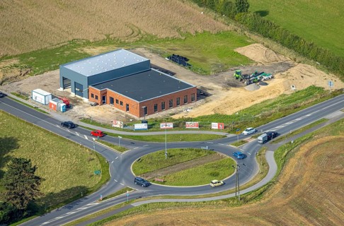 Aerial view, construction site new development area with roundabout Hammweg and Grenzstraße,