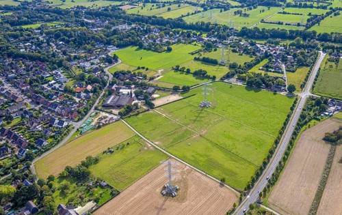 Aerial view, power line project with power pole construction for power line at Hammweg, Voerde,