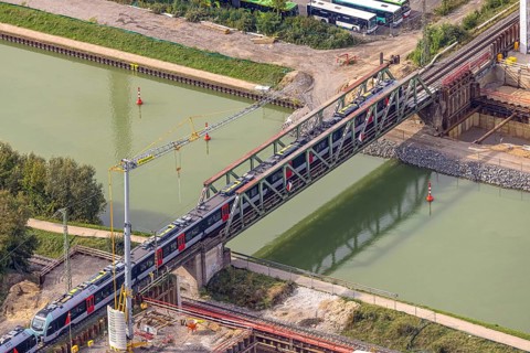 Aerial view, S-Bahn over a railway bridge Wesel-Datteln-Kanal, construction site and demolition of