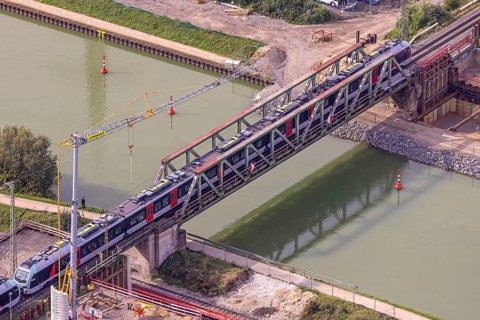 Aerial view, S-Bahn over a railway bridge Wesel-Datteln-Kanal, construction site and demolition of