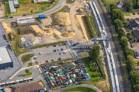 Aerial view, Friedrichsfeld (Niederrhein) railway station, construction site with new building and