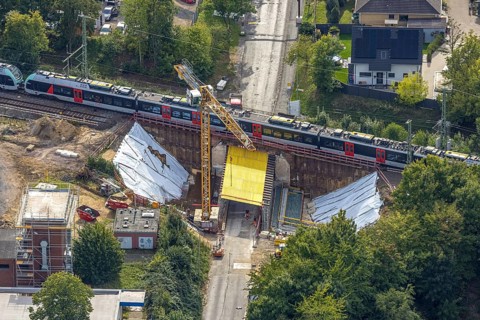Aerial view, S-Bahn and railway line across Spellener Straße, bridge construction and extension of