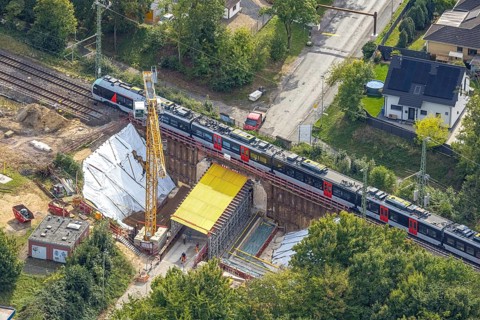Aerial view, S-Bahn and railway line across Spellener Straße, bridge construction and extension of