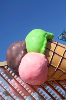 Ice cream cone with colourful ice cream scoops as decoration at the Bremer Osterwiese folk