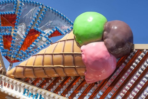 Ice cream cone with colourful ice cream scoops as decoration at the Bremer Osterwiese folk