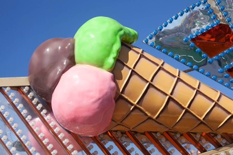 Ice cream cone with colourful ice cream scoops as decoration at the Bremer Osterwiese folk