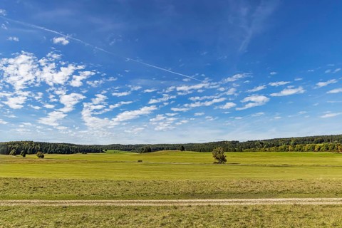 Pristine landscape in the Swabian Alb biosphere reserve with blue skies and small clouds. The