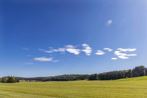 Pristine landscape in the Swabian Alb biosphere reserve with blue skies and small clouds. The