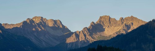 Mountain panorama at sunrise from Stillachtal into Warrmatsgundtal, on the left Alpgundkopf,