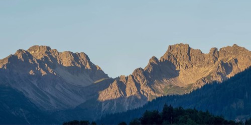 Mountain panorama at sunrise from Stillachtal into Warrmatsgundtal, on the left Alpgundkopf,