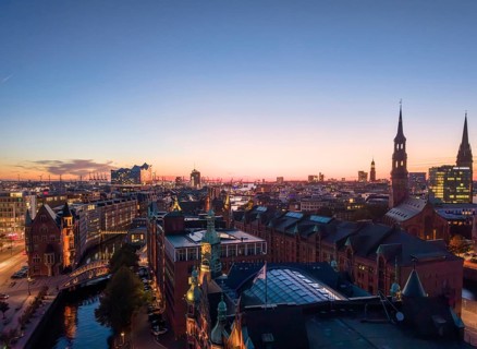 Aerial view of Hamburg's Speicherstadt warehouse district at sunset with a view of the