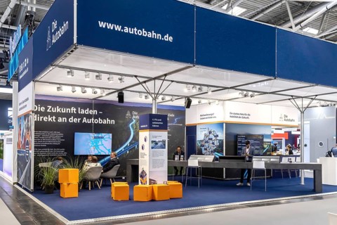 Exhibition stand Die Autobahn GmbH des Bundes. Logo and word mark. IAA MOBILITY in Munich. The