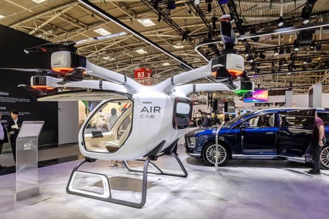 Exhibition stand of the Chinese manufacturer GAC, Guangzhou Automobile Group. Govy air taxi. Model