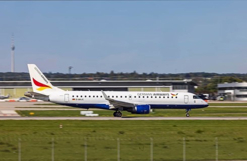 Stuttgart Airport with aircraft on the runway. Aircraft registration number: D-AKJC, German